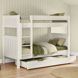 Zoomed Angled View of Classic Bunk Bed in White with Trundle Storage Drawer