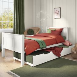Zoomed Angled View of Classic White Single Bed with Open Trundle and Trundle Mattress