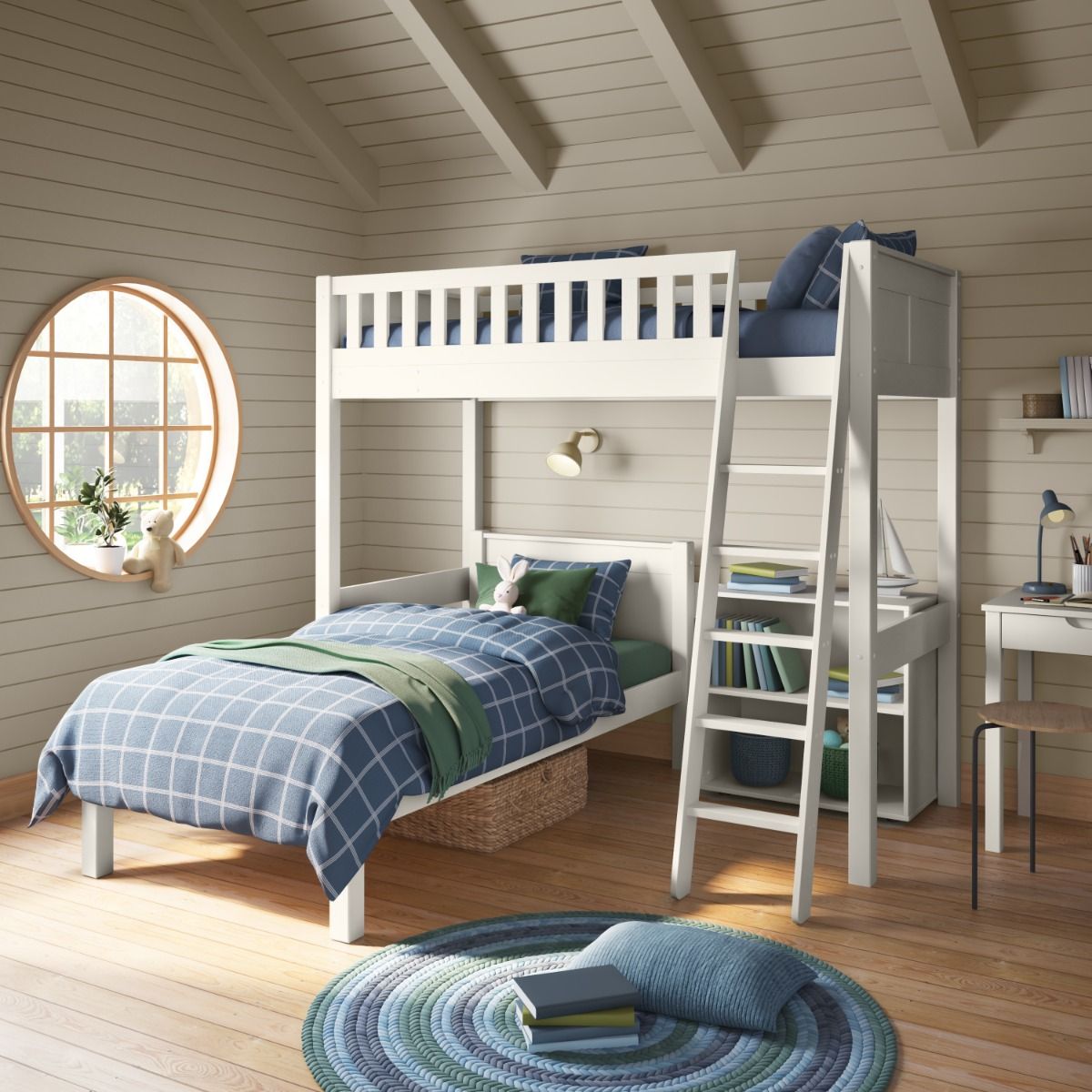 A closer angled view of Arven white high sleeper with single bed and low bookcase in a harmonious bedroom featuring tongue and groove wall panelled and cream colours mixed with blues and greens