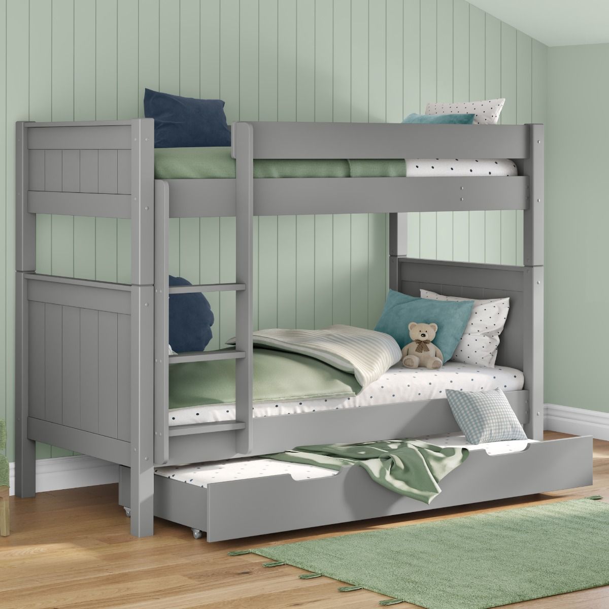 Zoomed Angled View of Classic Grey Bunk Bed with Trundle Drawer and Trundle Mattress
