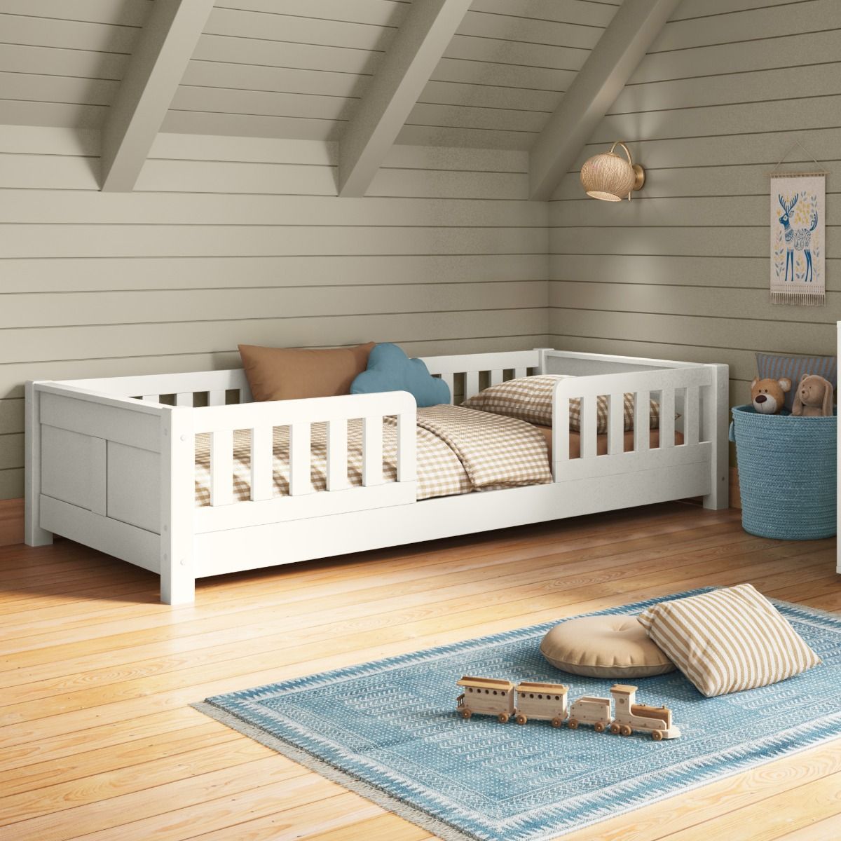 Closer view of Arven white Junior floor bed in a calm bedroom setting, styled with muted blues and neutral colours.