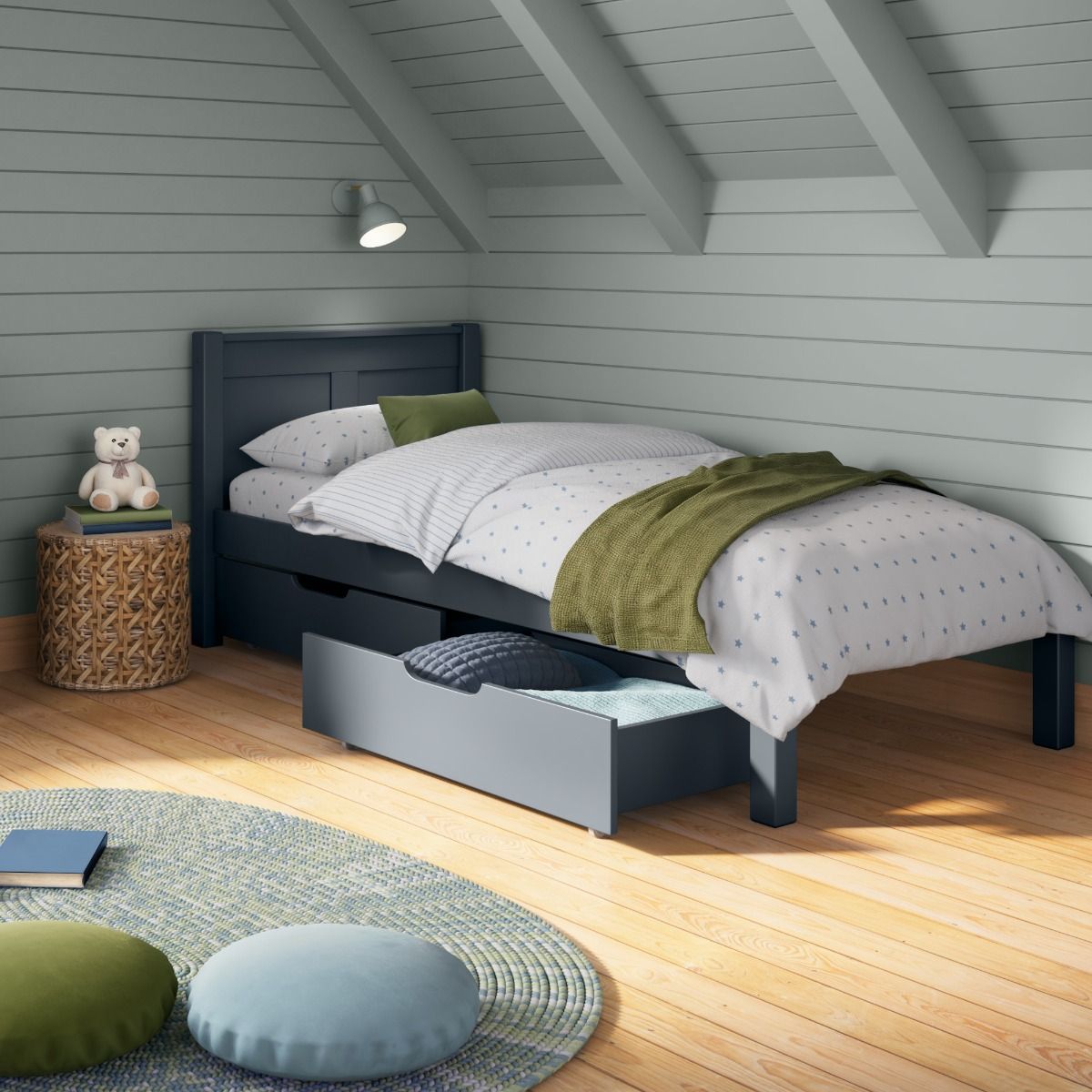 Closer view of Arven Blue Single Bed with a pair of drawers in a child's bedroom styled with muted blue and green colours.