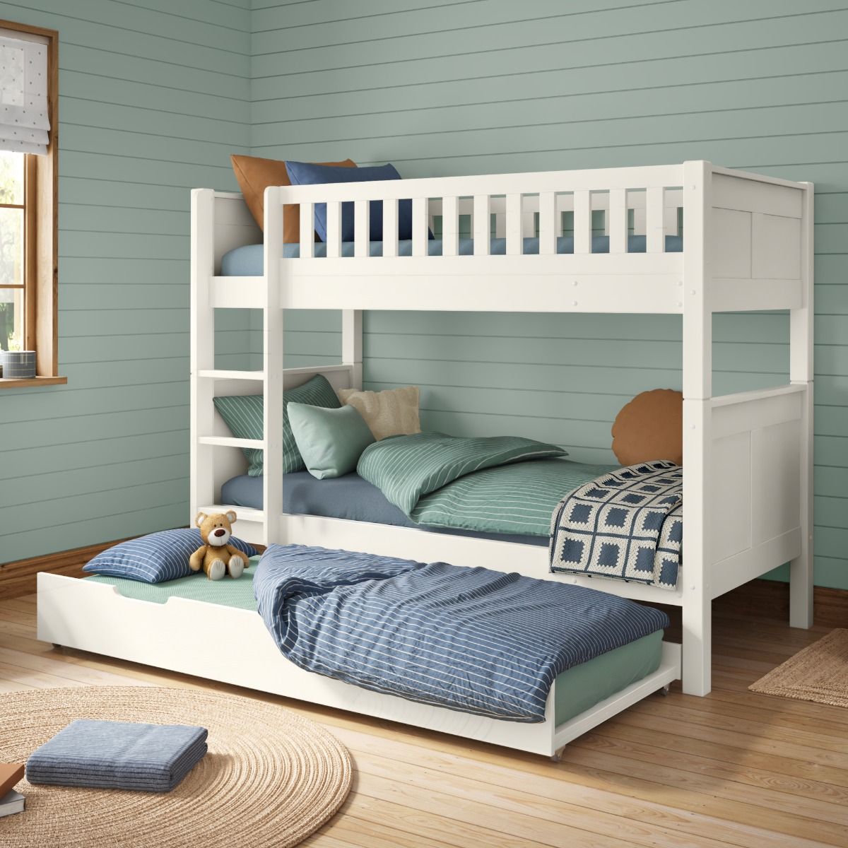 Zoomed Angled Front View of Stompa Arven White Detachable Bunk Bed with Open Trundle and Trundle Mattress Open