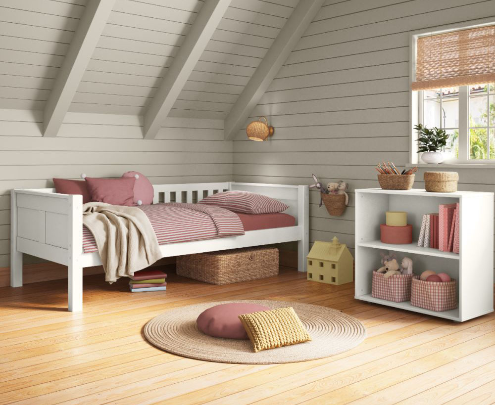 A white Junior bed with panel detailed headboard and footboard and rail back support