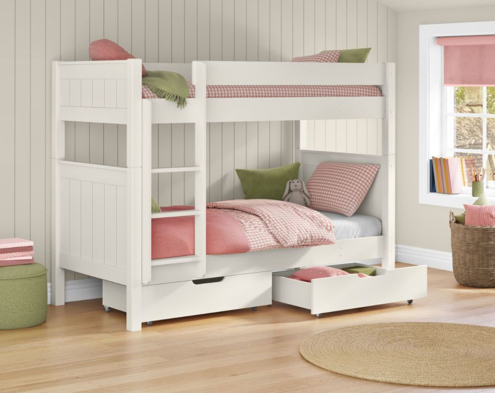 A white painted detachable bunk bed featuring tongue and groove details in the headboard and footboard with a pair of underbed storage drawers