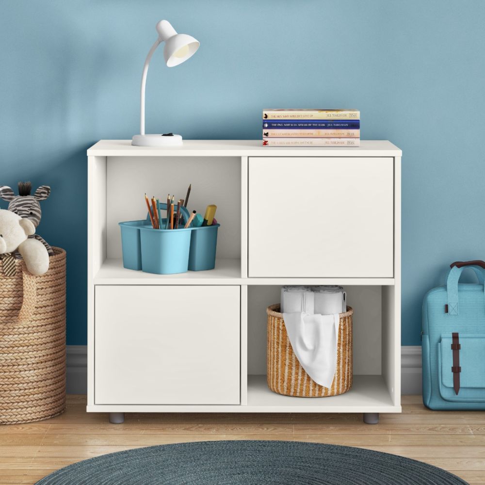 White storage cabinet divided into four equal compartment