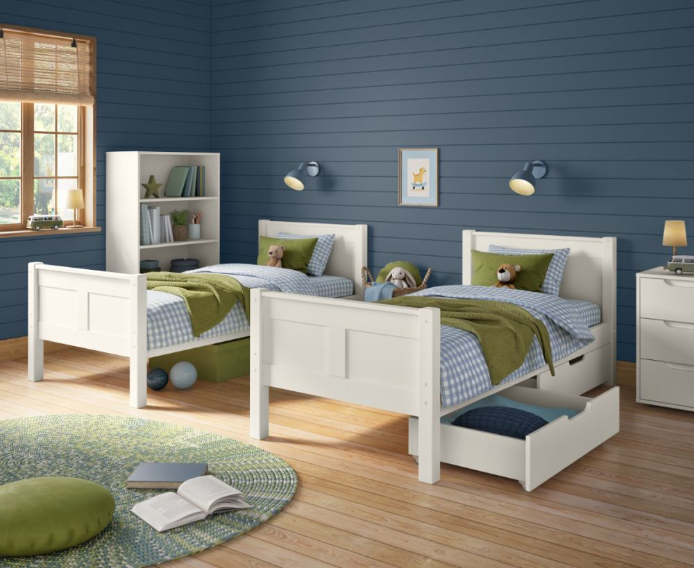 White bunk bed detached into 2 single beds with underbed storage